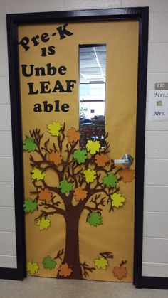 a door decorated with fall leaves and the words pre k is unbe leaf able