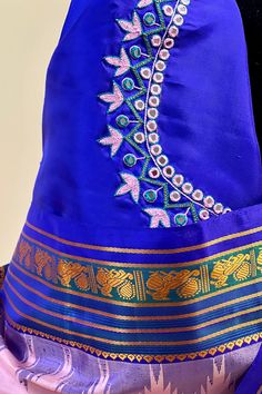 Fabric : Pure Kanjivaram Silk Type : Thread work korvai contrast Body Color : Light lotus pink Border Color : Bluish purple Blouse Color: Bluish purple Pallu Color: Bluish purple Approximate height - 46 - 52" Approximate weight - 1.4 lbs Approximate Length - 6.25 - 6.50 mtrs (inclusive of blouse length) Technique on the blouse : Aari and mirror work Saree comes with fall, picot and tassels done when applicable. Blouse piece is cut. Kindly Note : The colors you see on your device may vary due to Mirror Work Saree, Bluish Purple, Pink Border, Kanjivaram Silk Saree, Purple Blouse, Work Sarees, Body Color, Mirror Work, Thread Work