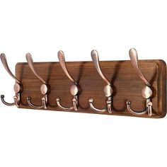 a coat rack with five hooks on it