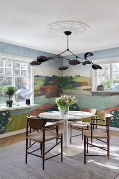 Transform your dining space into a breathtaking masterpiece with this vibrant landscape wallpaper. Inspired by the stunning beauty of the French countryside, this wallpaper features vivid colors and bold brushstrokes that will captivate your guests.