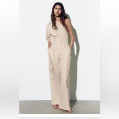 Brand New Casual Spring Jumpsuit With Asymmetrical Design, Chic Wide Leg Overalls For Work, Asymmetrical Jumpsuits And Rompers For Summer Workwear, Zara Wide Leg Summer Pantsuit, Asymmetrical Summer Jumpsuits And Rompers For Work, Asymmetrical Jumpsuits And Rompers For Summer, Summer Asymmetrical Jumpsuits And Rompers, Zara Summer Wide Leg Pantsuit, Chic Zara Jumpsuits And Rompers With Pockets