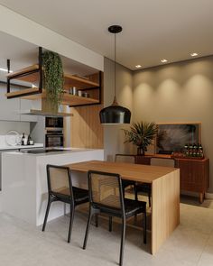 the kitchen is clean and ready to be used as a dining room or living area