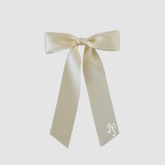 The Zoe petite satin ribbon hair bow is a slimmer version of the Zoe bow, perfect for fashion-forward girls of all ages. This bow adds a playful touch to any outfit. Look cute and stylish with the Zoe Petite Bow! * Satin ribbon * Bow 5.5" W x Tails 7.25" L * Alligator clip with a no-slip grip | French barrette | Elastic hair tie * Handmade in the USA * Small women-owned business *Please note that bows are handcrafted and may vary slightly in size and look. Measurements are approximate. **NEVER leave children unattended or sleeping while wearing ANY hair accessories from Your Final Touch. Products may contain parts that can pose a choking hazard or strangulation Satin Hair Bow, Satin Ribbon Bow, Bride Hair Accessories, Ribbon Hair Bows, French Barrette, Small Women, Elastic Hair Ties, Ribbon Hair, Velvet Bow