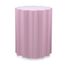 a pink vase sitting on top of a white table