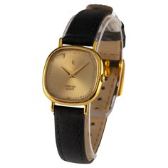 Concord Women's 18k Yellow Gold Quartz Watch w/ Leather Band Movement #959001 Case #5081460 Serial #4840XX 18k Yellow Gold Rounded Square Case 22 mm Wide (25 mm w/ Sapphire Cabochon Crown) 23 mm Long Lug-to-Lug Distance = 29 mm Lug-to-Lug Width = 12 mm Thickness = 4 mm Gold Dial w/ Gold Tic Marks and Hands (M + H) 20 mm Wide 20 mm Long Black Leather Aftermarket Band w/ Gold-Plated Aftermarket Clasp Total Length = 8" Largest Wrist Fit = 7.25" Width at Case = 12 mm Width at Tip = 10 mm Total Mass (Includes Band and Movement) = 14.9 grams Does Not Include Original Box or Papers Sapphire Cabochon, Rounded Square, Long Black, Leather Band, Quartz Watch, Wrist Watch, Jewelry Watches, Gold Plate, Sapphire