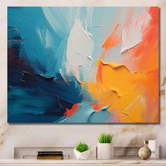 an abstract painting is displayed on the wall above a fireplace mantel in a living room