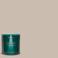 a can of marjoiee paint on a gray background