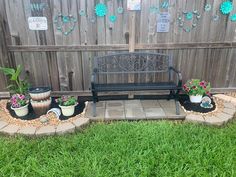 a bench sitting in the middle of a yard