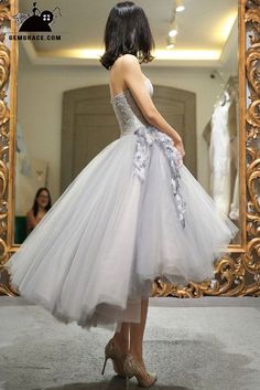 High Low Grey Tulle Strapless Wedding Party Dress Tea Length with Petals Wedding Tea Length Dress With Tulle Skirt, Tulle Tea Length Evening Dress For Prom, Tulle Tea-length Wedding Dress, Strapless Tulle Dress With Fitted Bodice For Banquet, Strapless Tulle Evening Dress For Wedding, Tulle Tea-length Evening Dress For Prom Season, Strapless Tulle Ball Gown For Wedding, Fitted Bodice Tea Length Evening Dress For Wedding, Tea-length Evening Dress With Fitted Bodice For Wedding