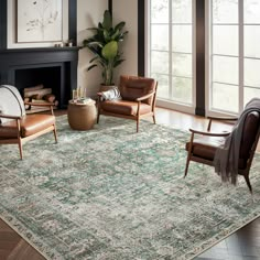 a living room with two chairs and a rug in front of a fire place on the floor