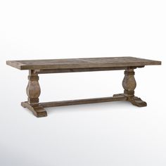 an old wooden table on a white background