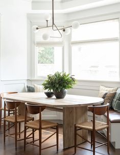 three different views of a dining room and living room with white walls, wood flooring,