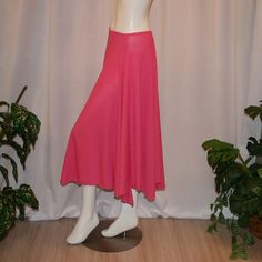 will fit size 3/4-9/10, stretchy Experience the ultimate in style and movement with our Pink Dance Skirt-Bubble Gum Bash. Its tulip shape and mid-calf length create a striking silhouette, while the ribbed knit fabric adds a touch of texture and flow on the dance floor. Pair it with your own top or let us custom make one to complete your Barbie-inspired look. Don't miss out on this must-have piece! Stretch Pleated Midi Skirt, Elegant Ribbed Stretch Bottoms, Spring Stretch Midi Skirt Bottoms, Elegant Stretch Ribbed Skirt, Elegant Ribbed Stretch Skirt, Stretch Midi Skirt For Fall, Spring Midi Ribbed Skirt, Ribbed Stretch Midi Skirt, Stretch Long Skirt Bottoms For Fall