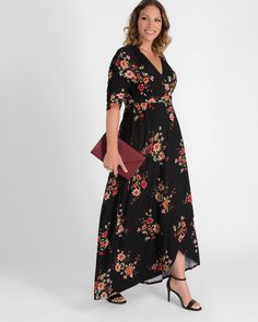 Our Meadow Maxi Dress was designed with wanderlust in mind. This carefree floral print maxi wrap dress features a ruched yoke and sleeves for a vintage flair. A slight hi lo hemline adds movement and shows off just a hint of skin for summer. This is the ideal plus size maxi dress for your next getaway or destination wedding. This floral maxi dress is made exclusively in women's plus sizes. Floral Print Maxi Wrap Dress For Vacation, Flowy Floral Maxi Dress With Surplice Neckline, Floral Print Maxi Length Wrap Dress, Bohemian Maxi Dress With Surplice Neckline And Floral Print, Beach Maxi Dress With High-low Hem And Floral Print, Beach High-low Hem Maxi Dress With Floral Print, Beach High-low Hem Floral Maxi Dress, Bohemian Floral Print Dress With High-low Hem, Bohemian Dress With Floral Print And High-low Hem