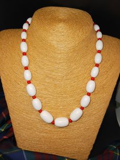 1970s graduated resin necklace/white oval beads separated by red beads.  Summer fun!  So cute with bandanias and jeans or a summer eyelet dress. Excellent  condition. 18" White Beaded Necklaces With Large Beads For Summer, Casual White Beaded Necklace With Large Beads, Casual White Beaded Necklaces With Large Beads, White Handmade Retro Beaded Necklaces, Red Large Beads Necklace For Beach, Handmade Retro Red Beaded Necklaces, Handmade Red Beaded Retro Necklace, 1970s Summer, Vintage White Multi-strand Beaded Necklaces