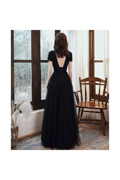 Shop tulle black long formal dress with beading top online. Sheprom offers formal or casual style dresses to fit your special occasions. Black Evening Dress With Sheer Bodice For Banquet, Formal Tulle Maxi Dress With Sweep Train, Black Floor-length Gown With Illusion Neckline, Elegant Homecoming Gown With Tulle Skirt, Black Prom Gown With Illusion Neckline, Black Gown With Illusion Neckline For Prom, Formal Black Maxi Dress With Lace Bodice, Evening Maxi Dress With Tulle Skirt For Prom Season, Black Floor-length Maxi Dress With Lace Bodice