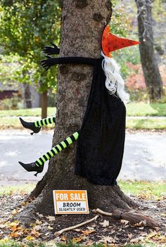 a tree with a halloween decoration on it