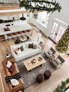 an overhead view of a living room and kitchen