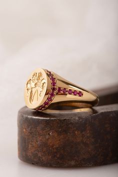 A family crest signet ring that can be personalized with your own crest. We can set different gemstones instead of diamonds, such as red ruby, blue sapphires, green emerald or a combination. Gemstones: Natural Ruby 0.66ct VSGH1 *real images of the ring, taken by us* Face Size: 15x13mm Material: - Sterling Silver (925) - 9K Gold (375) - 14K Gold (585) - 18K Gold (750) *All signet rings are hallmarked on the back for certification* - We offer FREE Worldwide DHL & FedEx Shipping! - Branded Danelian Luxury Red Intaglio Signet Ring, Signet Rings Family Crest, Luxury Red Signet Ring For Wedding, Family Crest Signet Ring, Signet Ring With Gemstones, Heirloom Ruby Signet Ring With Hallmark, Signet Diamond Ring, Ruby Signet Ring With Polished Finish, Luxury Yellow Gold Signet Ring With Coat Of Arms