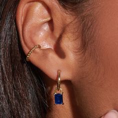 Unleash your inner elegance with our Iris Sapphire Hoops. Crafted with rich sapphire stones and shaped like a lock, these 14K gold-plated earrings add a pop of exquisite color and a unique charm to your ensemble.  Sapphire is also known as September birthstones.  14k gold plated over sterling silver.  Hypoallergenic, nickel, and lead-free. Tarnish resistant. H2O sensitive. Recommend taking them off during shower and storing in the pouch that comes with the package. Baguette Hoop Earrings, Sapphire Stones, September Birthstone Jewelry, August Birthstone Jewelry, July Birthstone Jewelry, Zodiac Jewelry, Jewelry Ring Box, Earrings Small, Gifts For New Mums