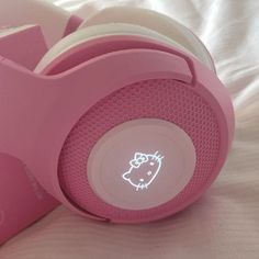 the hello kitty headphones are pink and have light up buttons on each earpiece