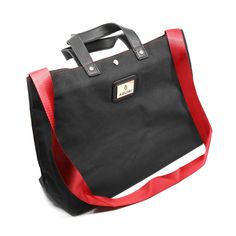 Azumi tote bag in black with red straps. Dimensions: 17"x11"x6" Top Handle Bag, Tote Bag, Red, Black