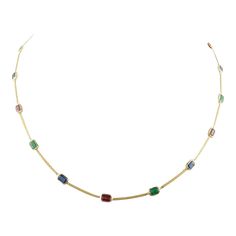 This is part of Chairish’s Fine Jewelry assortment.  Emerald Ruby Sapphire Choker Necklace studded with emerald, ruby and sapphire in 18K Gold. This stunning piece of jewelry instantly elevates a casual look or dressy outfit.  Emerald enhances the intellectual capacity, sapphire stimulates concentration and reduces stress and ruby improves mental strength.  Designed with octagon cut emerald, ruby, sapphire set alternatively with each other in between the chain making a stunning delicate necklace. This beautiful handcrafted necklace is a perfect Grandmother Gift, Bridal Shower Gift, Secret Santa Gift, Gift For Sister, Mother Daughter Gift, Bride To Be Gift, Bridesmaid Gift, Thanksgiving Gift, Halloween Gift, Christmas Gift or any Holiday Gift for Mother, Sister, Daughter, Grandma, Fiancé, G Elegant Multi-stone Emerald Necklace For Formal Occasions, Elegant Multicolor Gemstone Emerald Necklace, Elegant Multicolor Gemstone Necklace, Sapphire Choker, Ruby And Sapphire, Dressy Outfit, Chain Making, Mother Daughter Gifts, Mental Strength