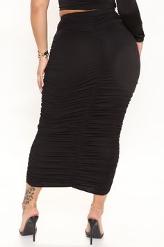 Available In Black, Charcoal, And Chocolate. Midi Skirt High Waist Ruched Elastic Waistband Stretch 96% Polyester 4% Spandex Imported | Flaunting It Ruched Midi Skirt in Black size Medium by Fashion Nova Ruched Skirted Bottoms, Solid Color Ruched Skirted Bottoms, Black Ruched Stretch Skirt, Black Ruched Skirt In Elastane, Black Ruched Skirt Made Of Elastane, Ruched Stretch Bottoms For Night Out, Black Ruched Bottoms For Spring, High Waist Ruched Skirt With Stretch, High Waist Stretch Skirt With Ruched Detail