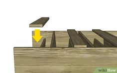 an image of wooden planks with yellow arrow pointing to the top and bottom part