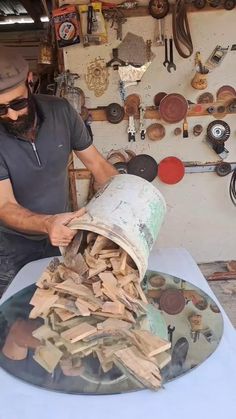 a man working on a piece of wood