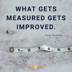 a measuring tape with the words what gets measured gets improved written on it