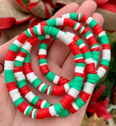 "🌟Ready to Ship🌟 This listing is for ONE Bracelet made with 6mm Vinyl Disc Beads in a Limited Edition Christmas Mix. 🎄 Please note that there could be some variation in color mixes! Every Bracelet will be UNiQuE 😊 These bracelets have already been hand strung and are ready to ship within 3 business days! Perfect for that last minute gift! *These bracelets do not include personalization or customization. *Bracelets are made and ready to ship. *Bracelets will be shipped within 3 business days Xmas Clay Bead Bracelet, Clay Bead Bracelet Ideas Preppy Christmas, Christmas Clay Bead Bracelets, Xmas Bracelets, Christmas Bracelet Ideas, Heishi Bead Bracelet, Christmas Jewelry Diy, Heishi Bracelets, Vinyl Disc