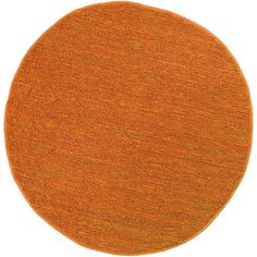 an orange round rug on a white background