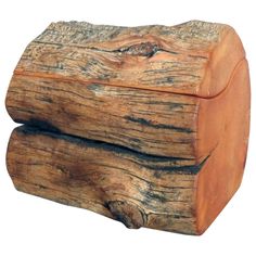 two pieces of wood sitting on top of each other