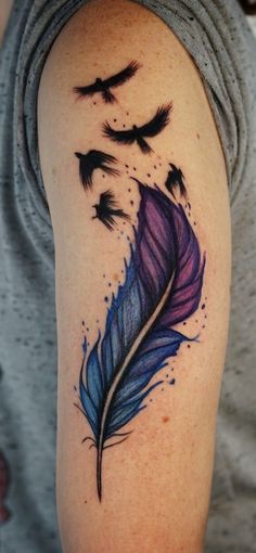 a woman with a tattoo on her arm has a purple feather and birds flying in the sky