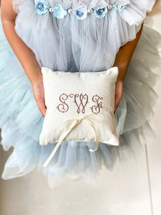 Introducing our exquisite Custom Embroidered Ring Bearer Pillow, a perfect accessory for your special day. This beautifully crafted pillow combines elegance and personalization to create a unique keepsake that will be treasured for years to come. Details of Listed Design: Fabric- Oatmeal Linen Yarn Color- Taupe Ribbon Color- Cream Embroidered Ring bearer pillow to mark the most momentous occassion in ones life. ----------- D E T A I L S ----------- - Fabric Used- 100% Linen or Cotton Sateen Fabric - Ribbon- Comes with a Satin Ribbon of your choice - Filled- The pillow is filled up using poly fill and sealed shut - Size- Multiple sizes available for you to choose ------------------ CARE INSTRUCTIONS ------------------ - Machine Washable - Tumble Dry Low - Iron at cotton heat setting - Do no Ring Bearer Pillow Dusty Blue, Needlepoint Ring Bearer Pillow, Royal Blue Ring Bearer Pillow, Monogram Ring Bearer Pillow, Embroidered Ring, Embroidered Ring Bearer Pillow, Rustic Ring Bearer Pillow, Ring Bearer Pillows, Ring Bearer Pillow