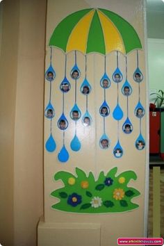 a door decorated with an umbrella and raindrops