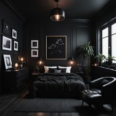 a bedroom with black walls and pictures on the wall