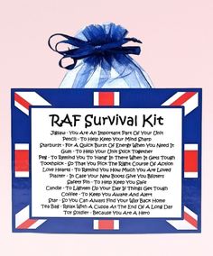 the raf survival kit is on display in front of a pink background with blue ribbon