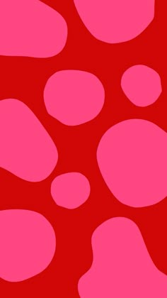 a red and pink background with circles