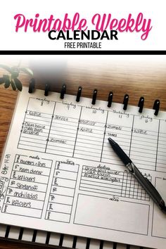 the printable weekly calendar is on top of a desk with a pen and notebook