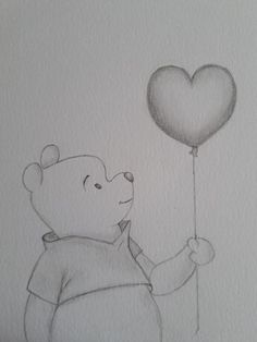 a drawing of a bear holding a heart shaped balloon