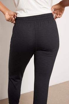 Perfect for laidback or on-the-go days, these Beyond Yoga joggers feature a slim-fit leg, drawstring elastic waistband, and zipper side pockets. The soft, four-way stretch heather fabric will keep you comfy-chic all day long. | BEYOND YOGA Women's Heather Rib Street Jogger Pants, Size Large, Black Go-dry Sweatpants For Yoga, Stretch Bottoms With Functional Drawstring For Yoga, Athleisure Yoga Bottoms With Functional Drawstring, Athleisure Yoga Bottoms With Drawstring, Athleisure Sweatpants With Comfort Waistband For Yoga, Black Yoga Pants With Elastic Waistband For Jogging, Athleisure Yoga Pants With Tapered Leg, Yoga Joggers With Ribbed Waistband, Athleisure Tapered Leg Yoga Pants