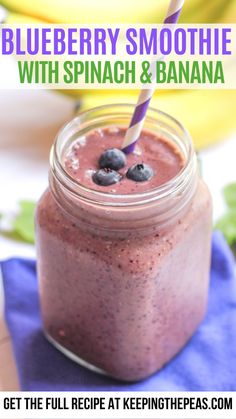 blueberry smoothie with spinach and banana in a mason jar