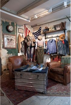 an old fashion clothing store with leather furniture