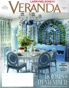 the cover of veranda magazine features blue chairs and a table with flowers in it