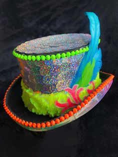 Neon colors with feathers & iridescent sequins and LED Lights. Military hat Marching Band or Top Hat choose a favorite style. Sparkly glitter sequins and feathers bedazzled rhinestones hat fashion in any color you want. Embellished Captains Hat, Military Festival Cap, Rave Hat, Burning Man Hat, Disco Hat, Rhinestone Hat is the perfect way to celebrate New Year's Eve, add to party outfit or best unisex present idea. Festival wear, festival styles, carnival burlesque costume. #burningman #tophat Light Up Clothes