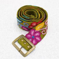 About this item Peruvian embroidered belt floral colorful Step into a world of vibrant colors and exquisite craftsmanship with our handcrafted wool embroidery belt. Each colorful belt is meticulously embroidered by skilled artisans using high-quality sheep wool, ensuring a one-of-a-kind piece that reflects the rich cultural heritage of the Andes. The vibrant colors are achieved using natural dyes derived from plants, flowers, and other organic sources, making each piece environmentally friendly Folk Style Multicolor Embroidered Belt, Folk Multicolor Embroidered Belt, Traditional Handmade Multicolor Belts, Handmade Bohemian Belt With Multicolor Embroidery, Handmade Bohemian Multicolor Belt, Handmade Multicolor Bohemian Belt, Bohemian Embroidered Belts With Multicolor Embroidery, Colorful Belt, Embroidery Belt