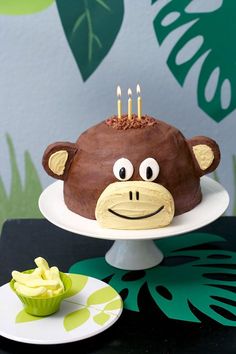 a birthday cake with a monkey face on it