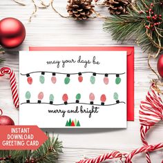 a christmas card with lights and candy canes on it, surrounded by holiday decorations